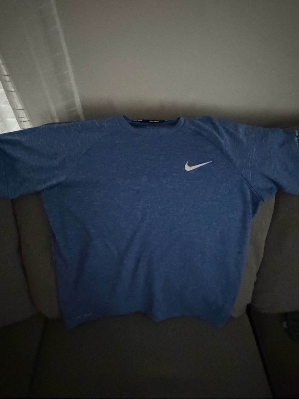 Nike Men’s Heather Blue t shirt with White Swoosh